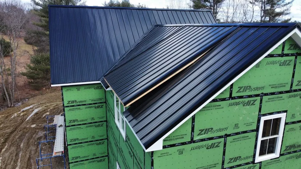 Slide of Freedom Roofing Maine