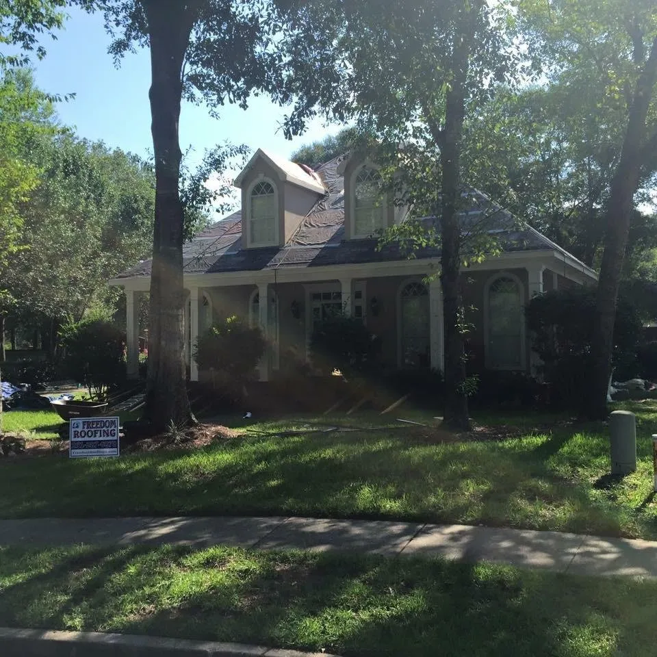 Slide of Freedom Roofing