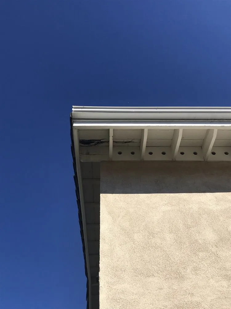 Slide of Freeman and Sons Roofing