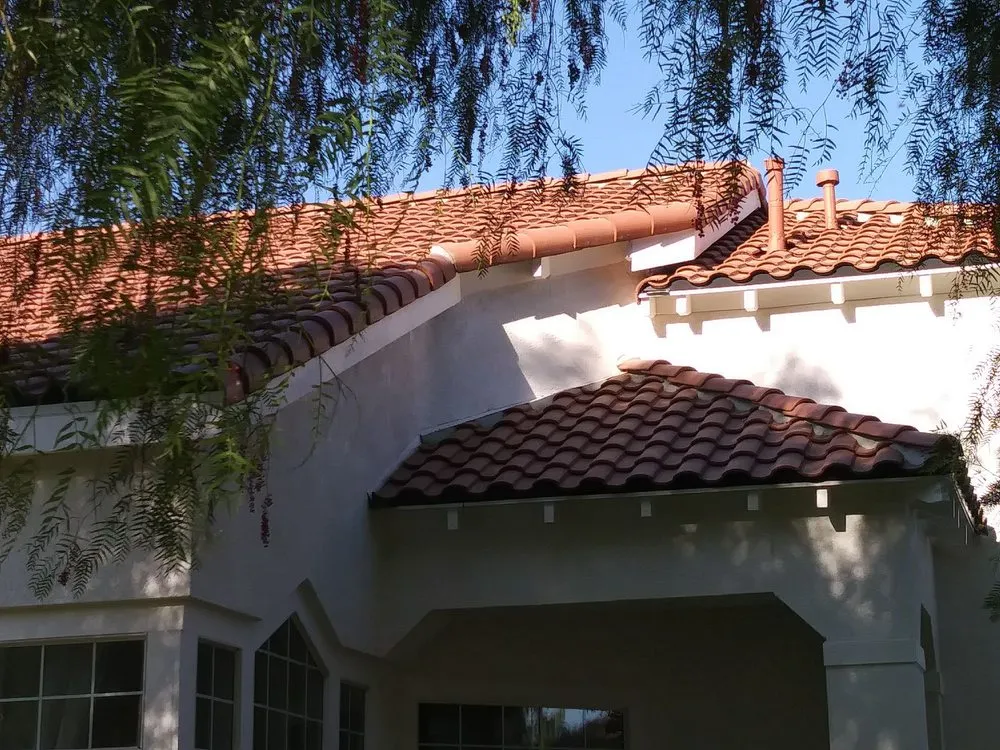 Slide of Freeman and Sons Roofing