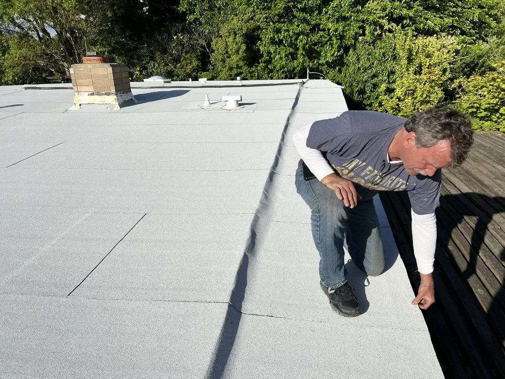 Slide of Freeman Roofing