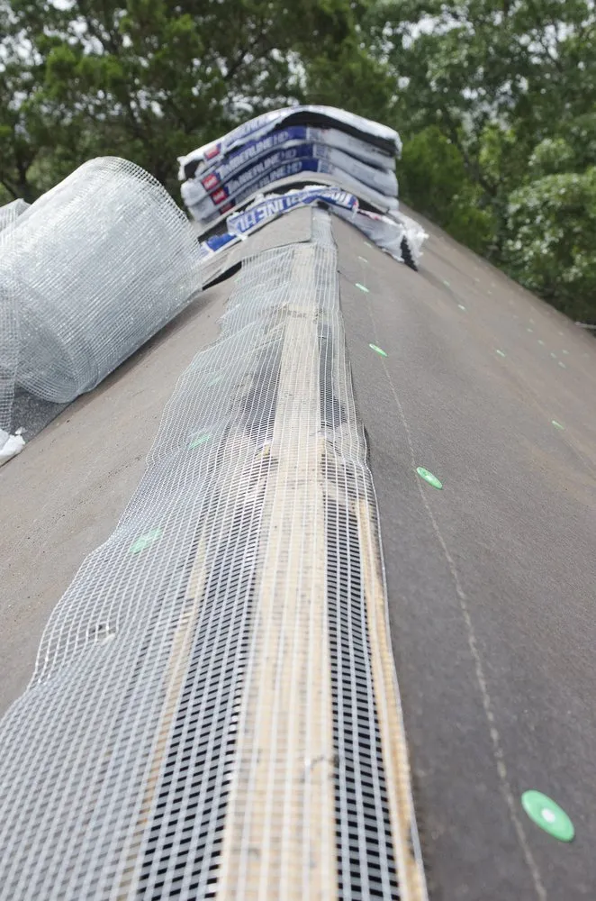 Slide of Freetail Roofing