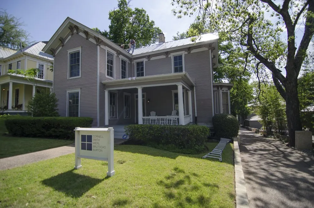 Slide of Freetail Roofing