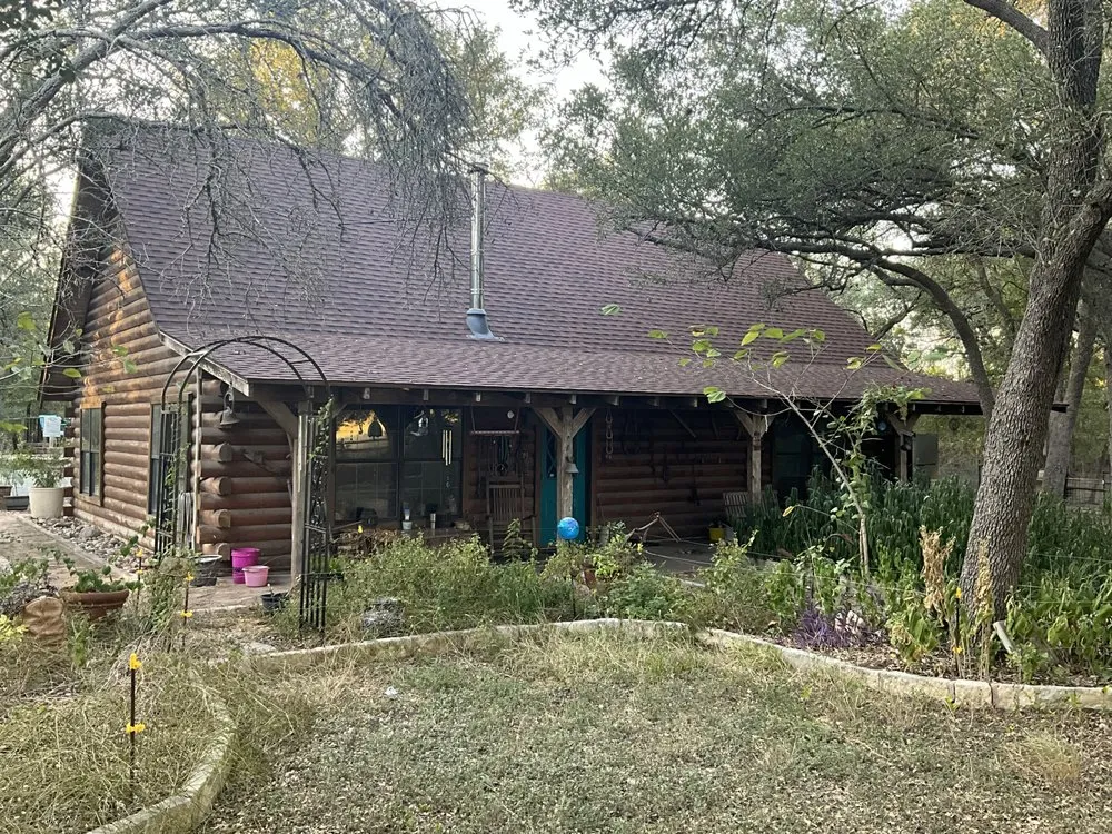 Slide of Freetail Roofing