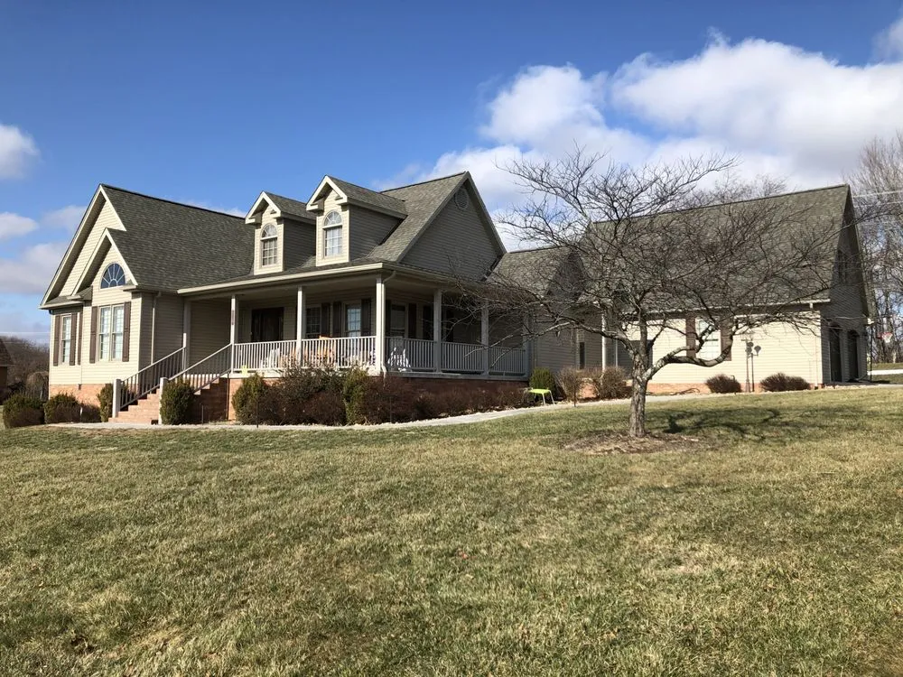 Slide of Frye Roofing