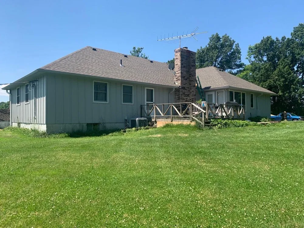 Slide of Fry's Roofing