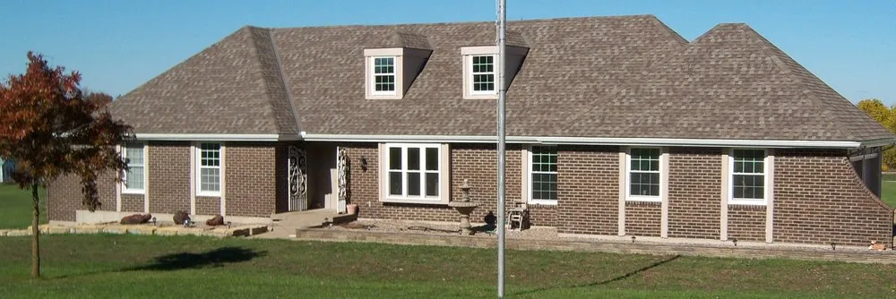 Slide of Fry's Roofing