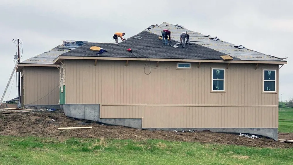Slide of Fry's Roofing