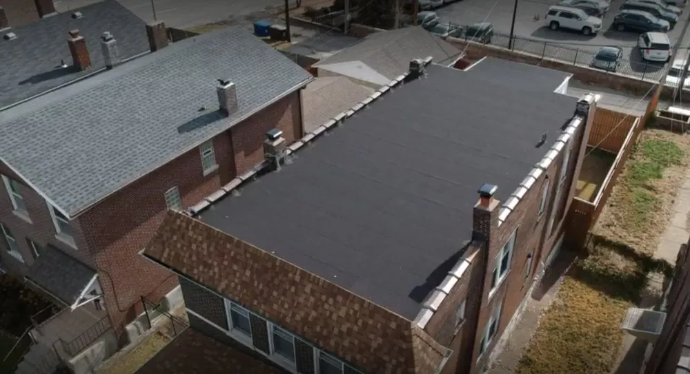 Slide of Fuchs Roofing