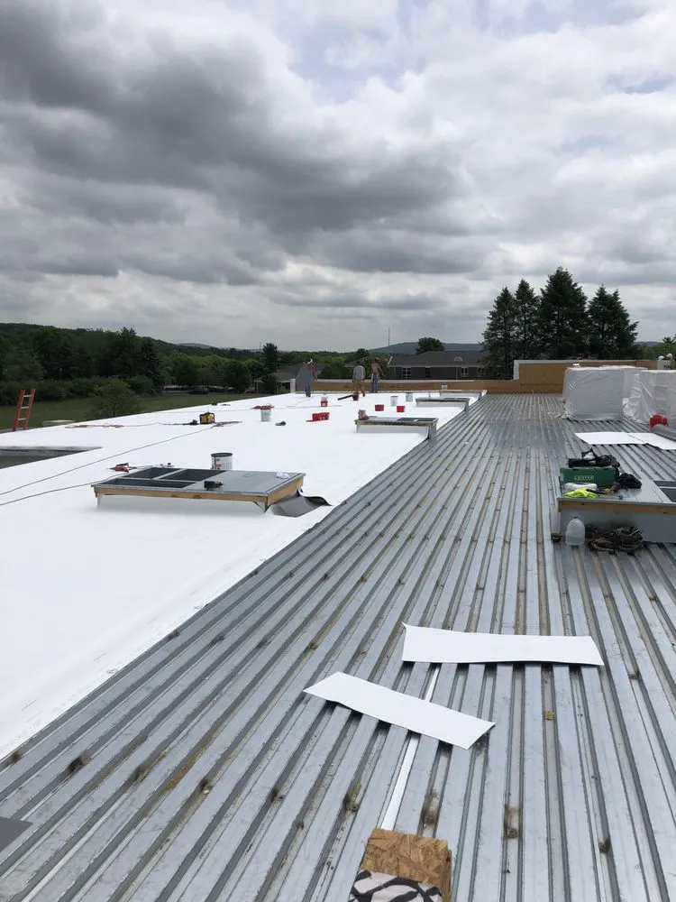 Slide of FXS Roofing & Sheet Metal