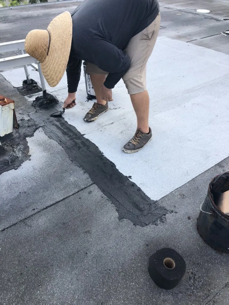 Slide of G & J Roofing