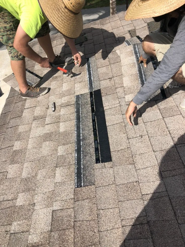 Slide of G & J Roofing