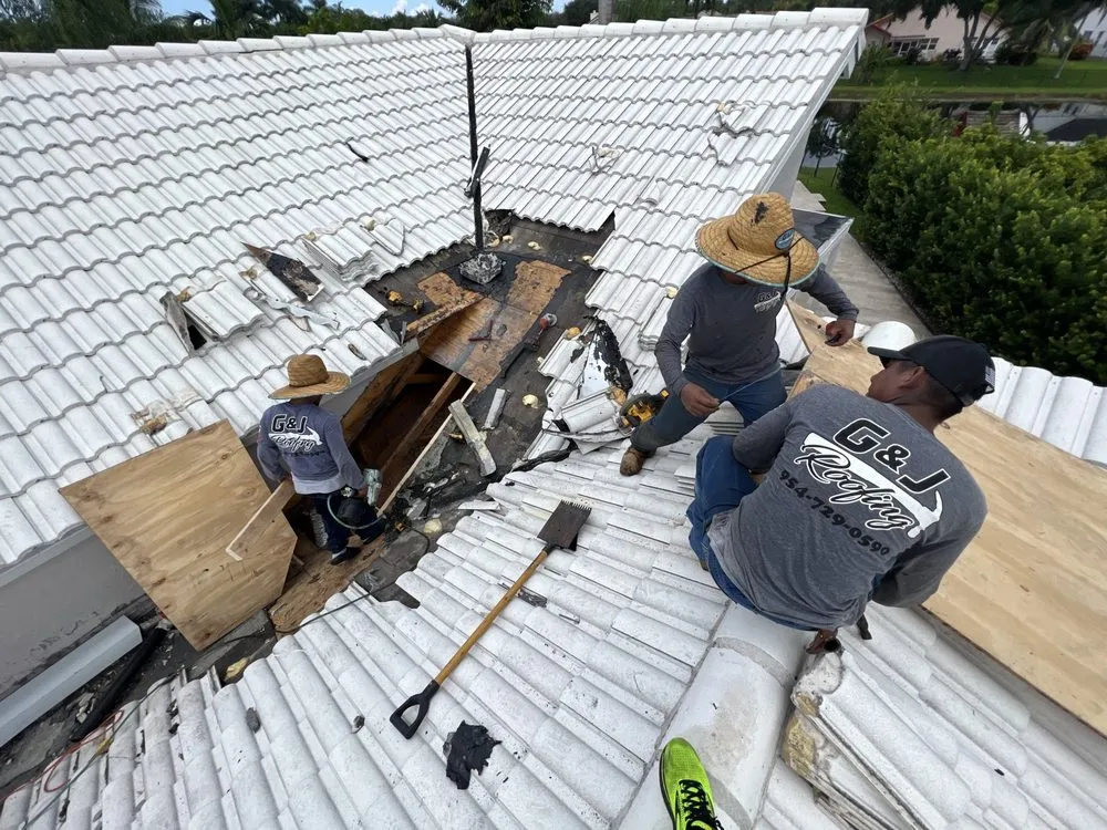 Slide of G & J Roofing