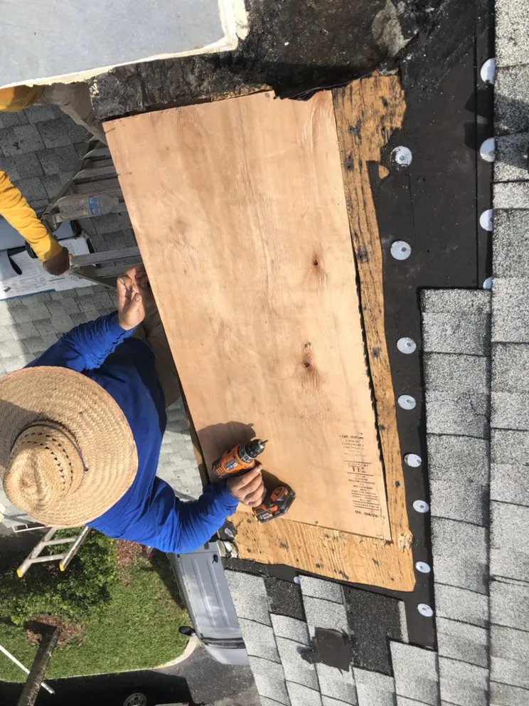 Slide of G & J Roofing