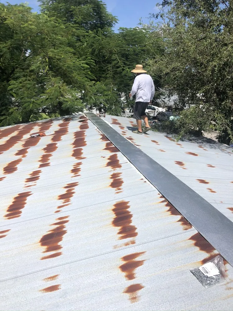 Slide of G & J Roofing