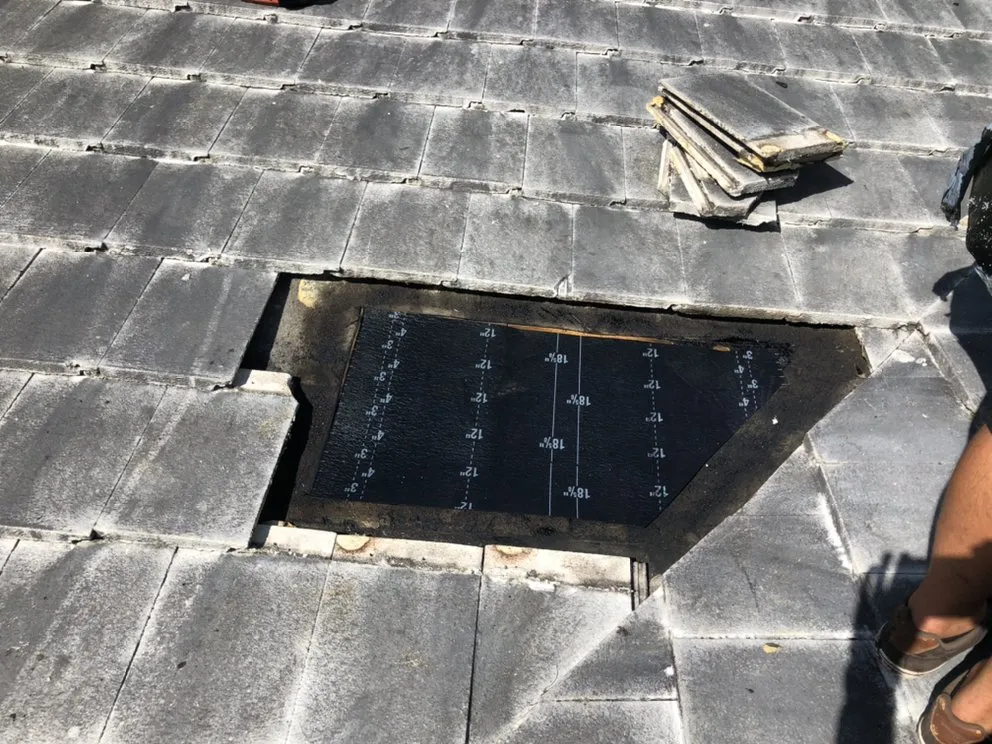 Slide of G & J Roofing