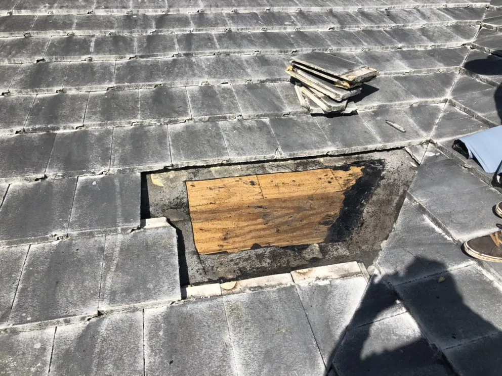 Slide of G & J Roofing