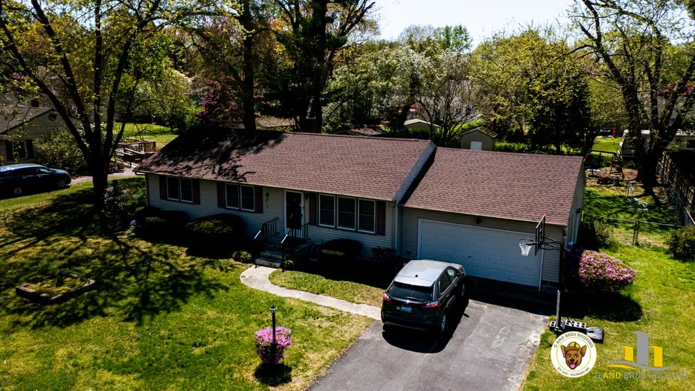 Slide of G and Bros Roofing