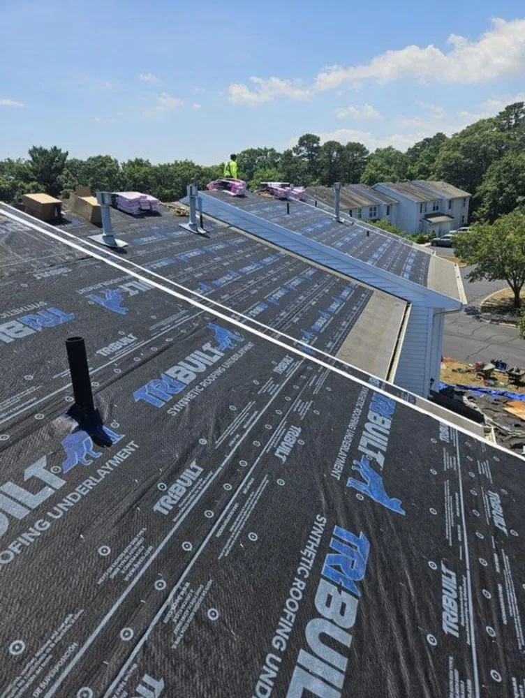 Slide of G R M Roofing