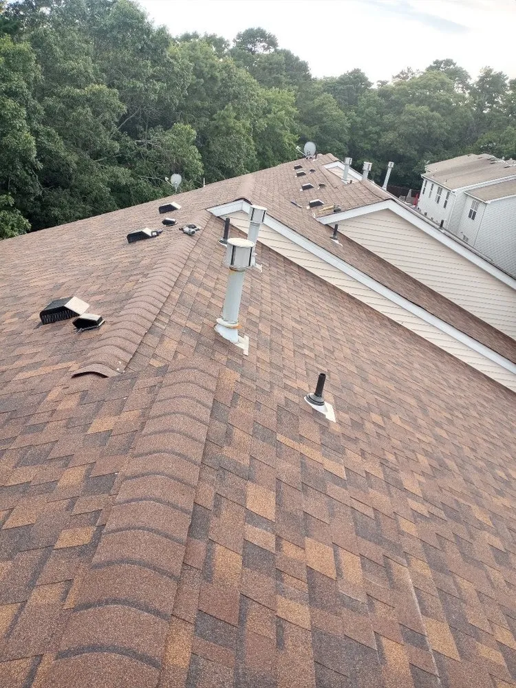 Slide of G R M Roofing