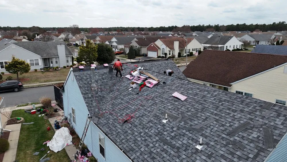 Slide of G R M Roofing