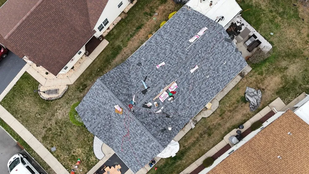 Slide of G R M Roofing