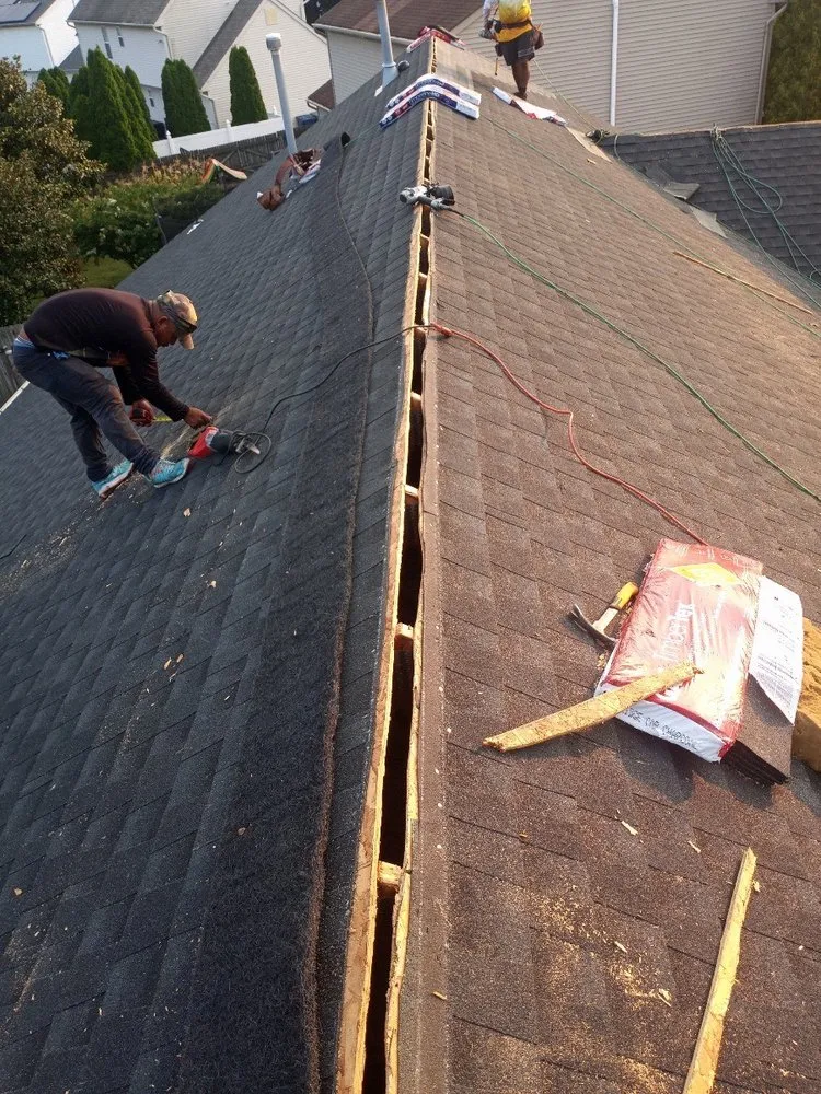 Slide of G R M Roofing