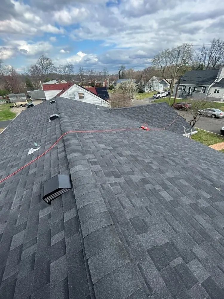 Slide of G R M Roofing