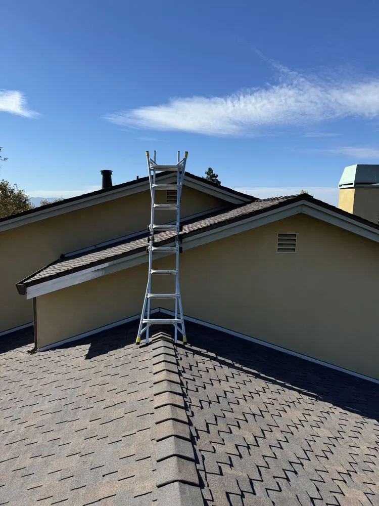 Slide of G West Roofing