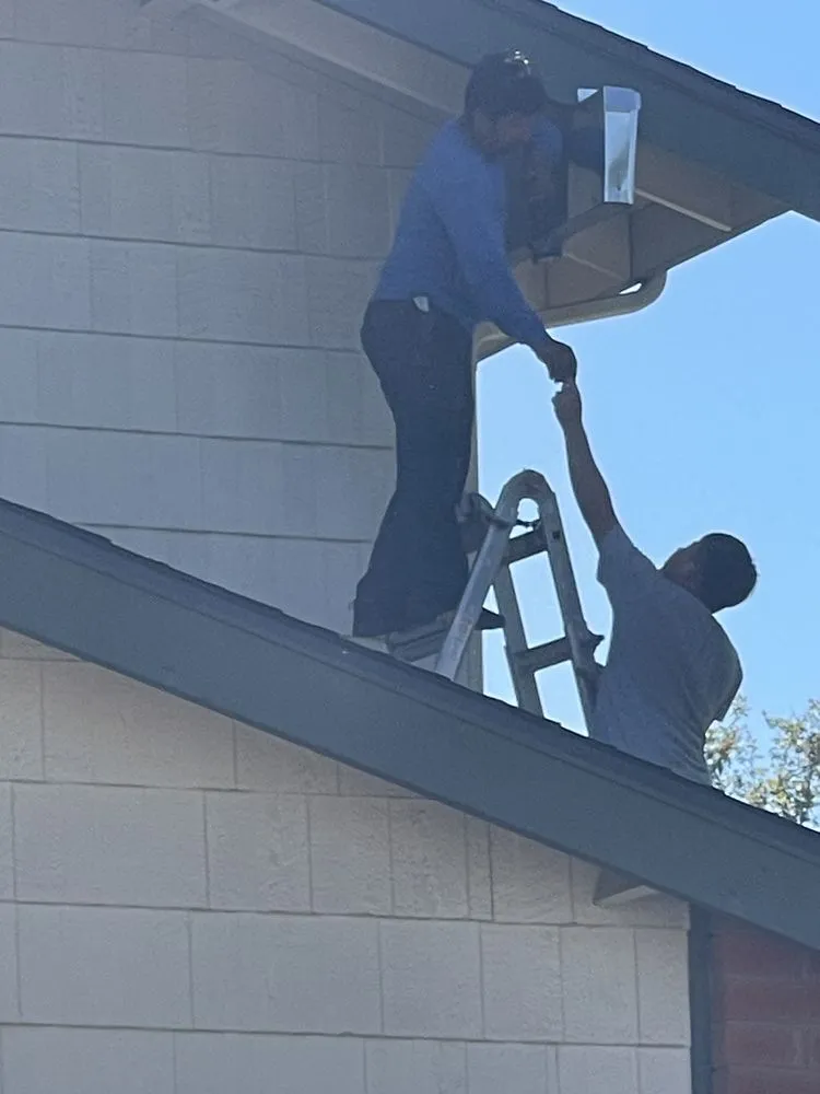 Slide of G West Roofing