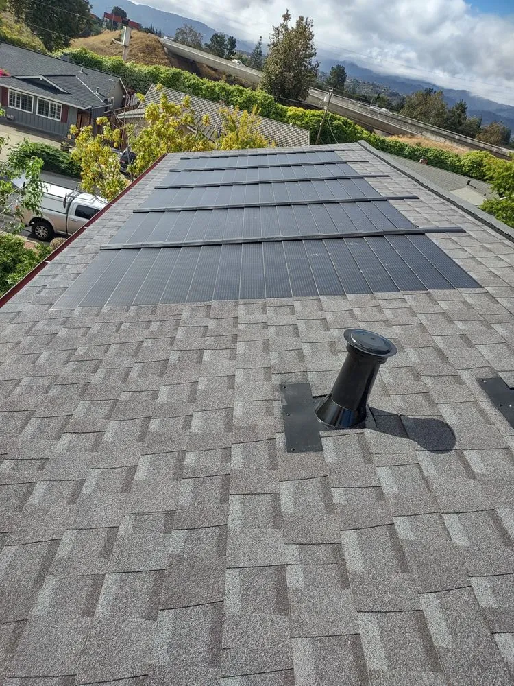 Slide of G West Roofing