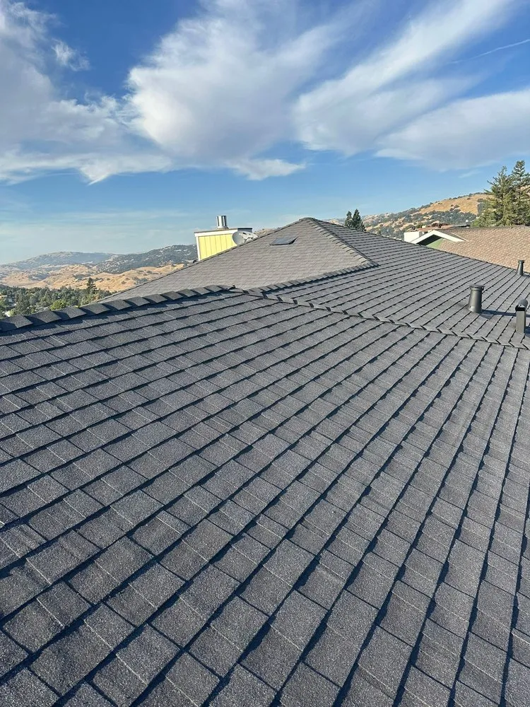 Slide of G West Roofing