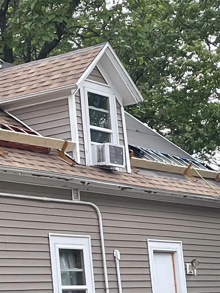 Slide of Gailan Group Roofing