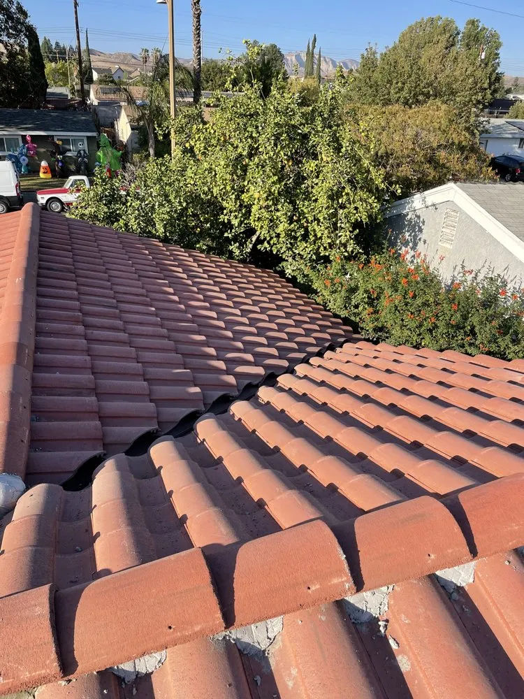 Slide of Galarzas Roofing