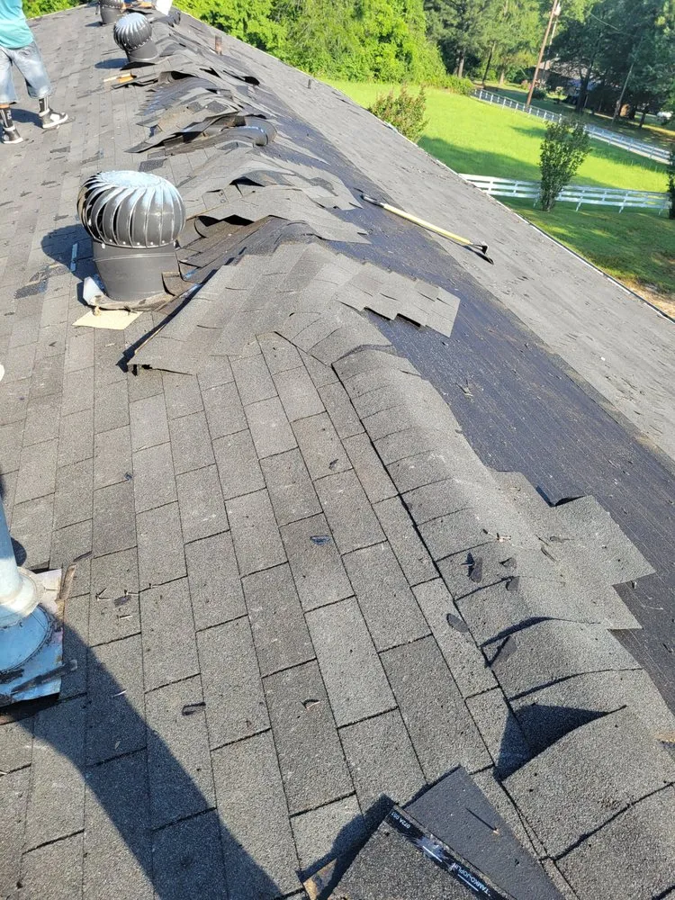 Slide of Galicia Roofing