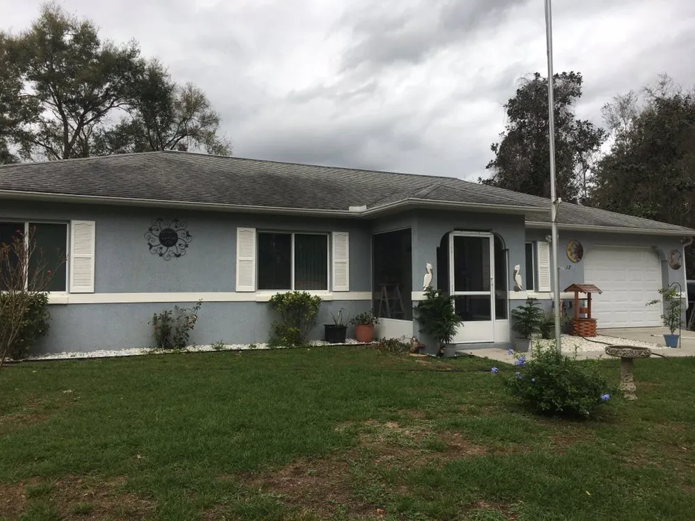 Slide of Gallagher Roof Cleaning