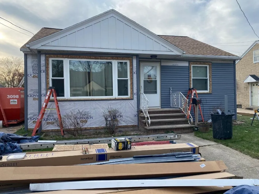 Slide of Gamas Roofing And Siding