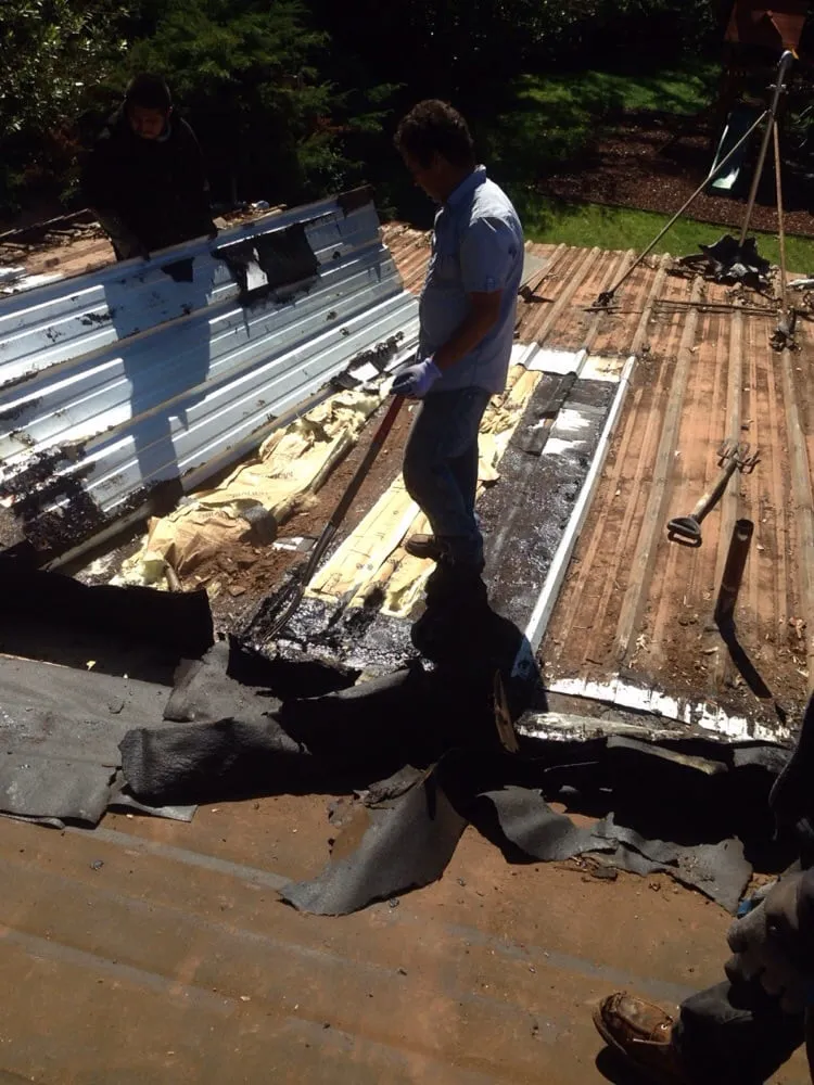 Slide of Gammalyn Roofing