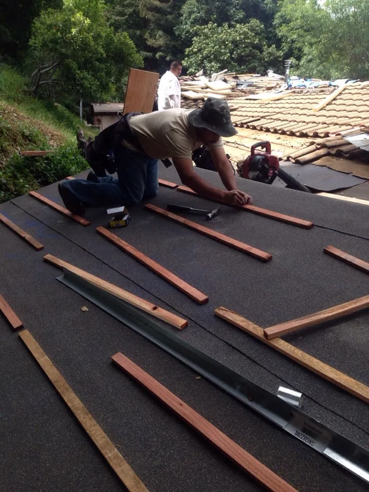 Slide of Gammalyn Roofing