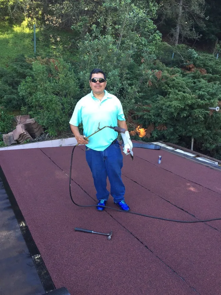 Slide of Gammalyn Roofing