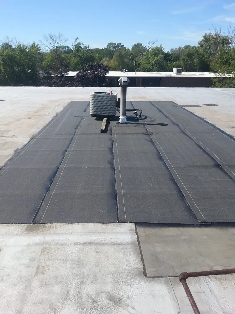 Slide of Garcia Flat Roofing Expert