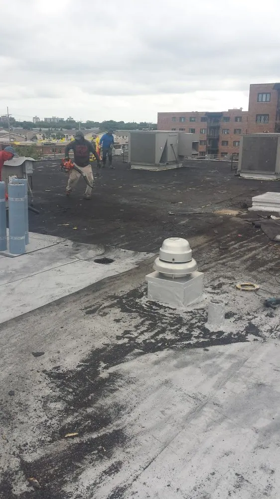 Slide of Garcia Flat Roofing Expert