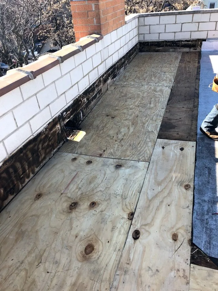 Slide of Garcia Flat Roofing Expert