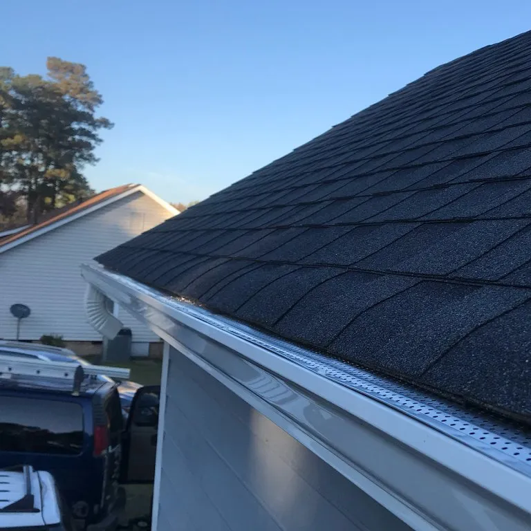 Slide of Garier Construction and Gutters