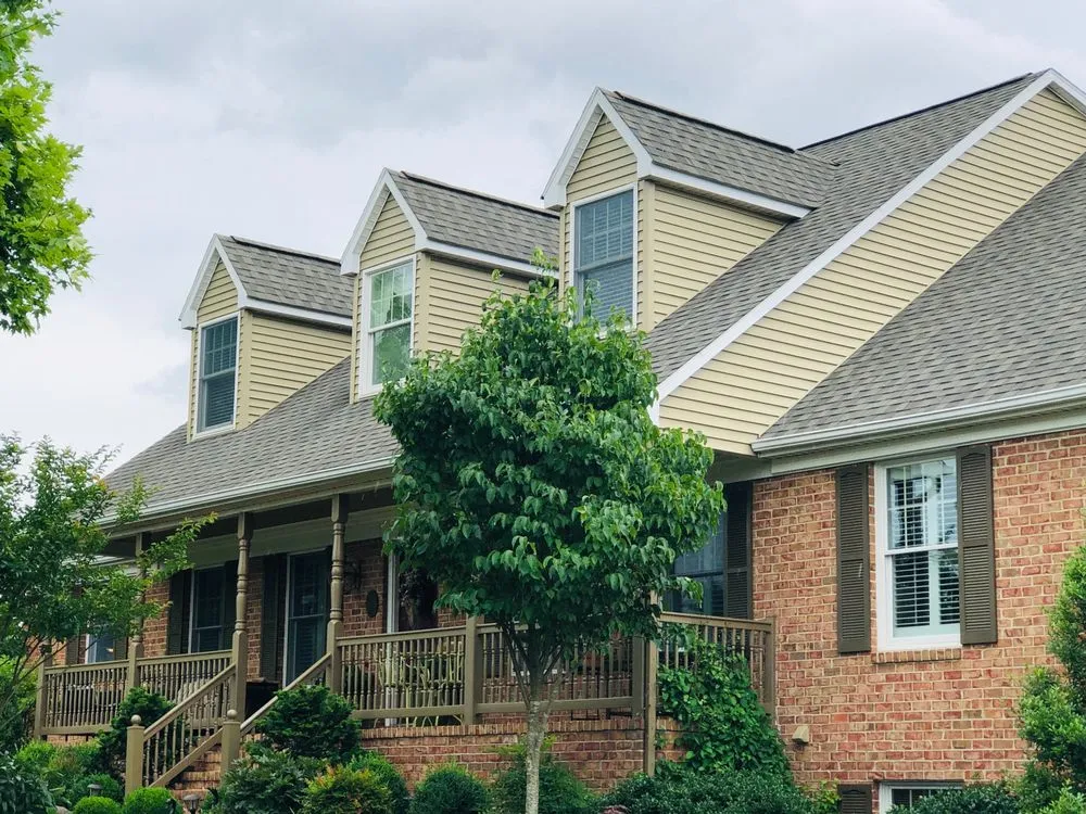 Slide of Garland's Roofing