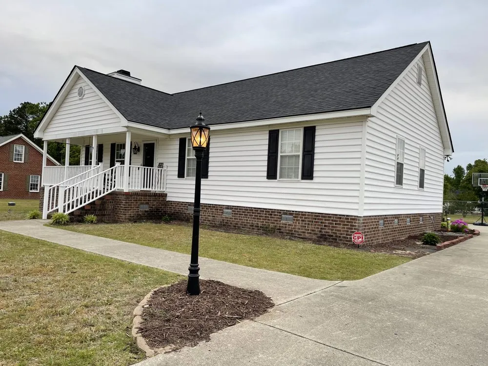 Slide of Garliss Roofing
