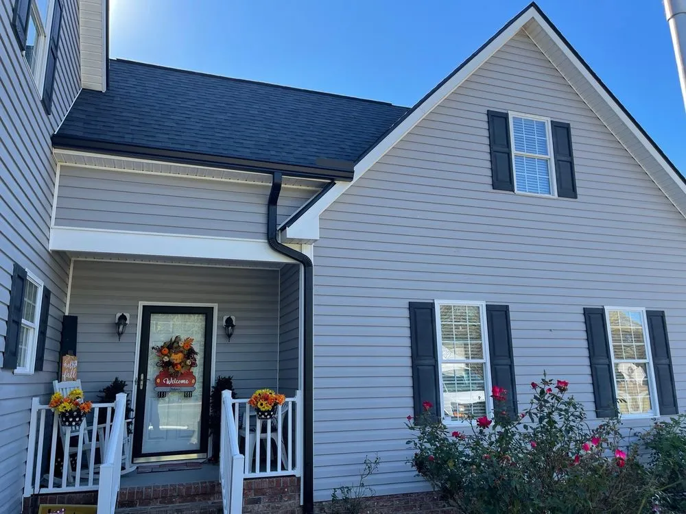 Slide of Garliss Roofing