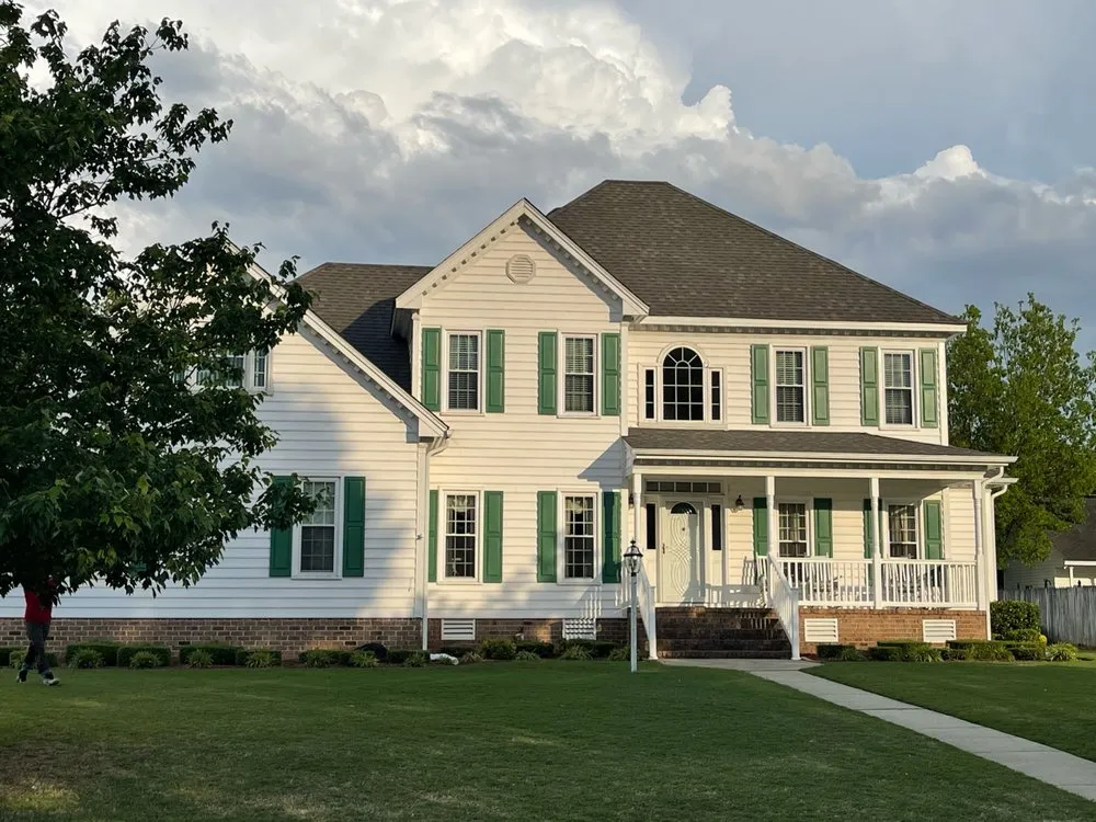 Slide of Garliss Roofing