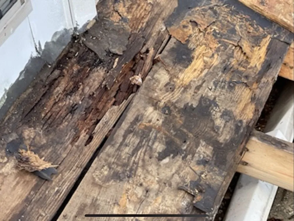 Slide of Garliss Roofing