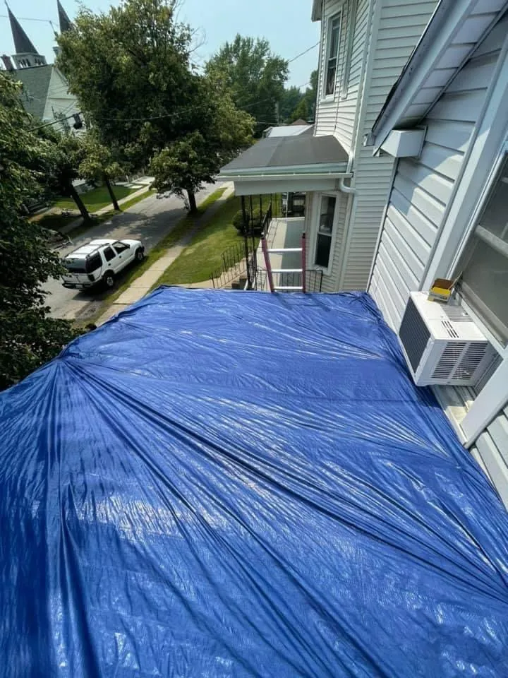 Slide of Garnos Roofing